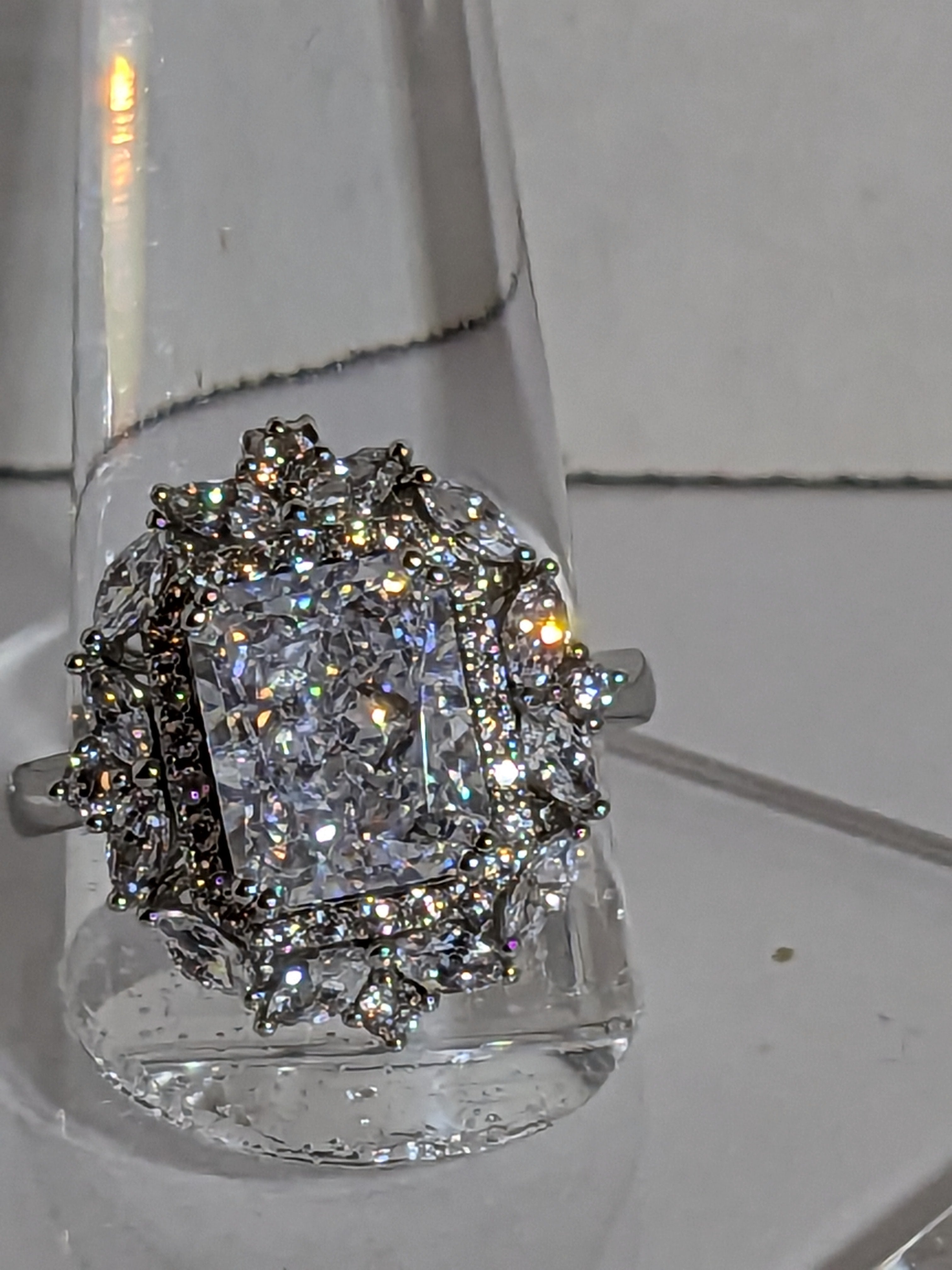 Lab Grown 2.3ct Emerald Cut Diamond Ring with a White Zircon Halo and Flower Cluster Filigree