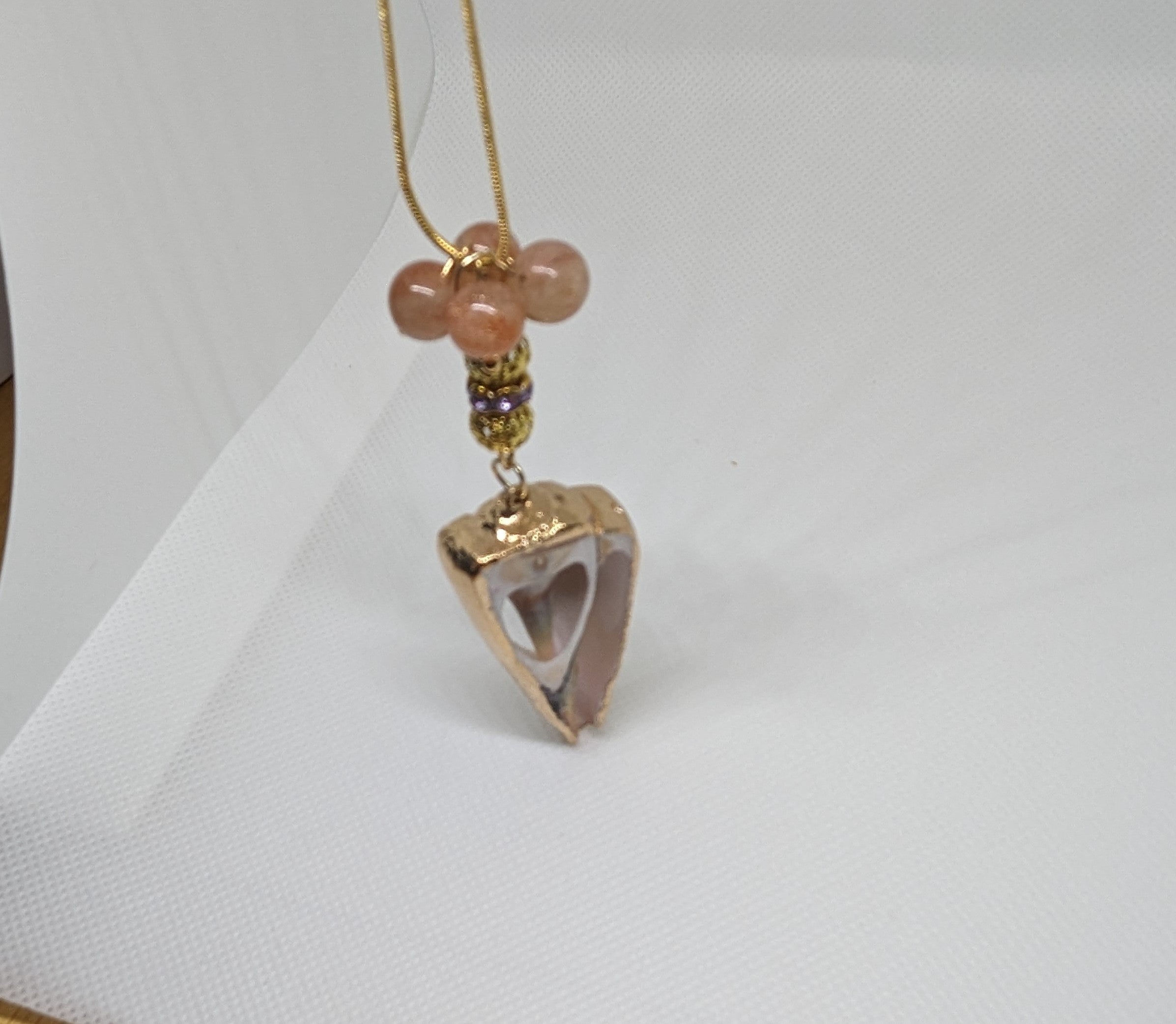 Handcrafted Necklace with Unique heart Shell Centerpiece and 5cttw Sunstone 22" chain