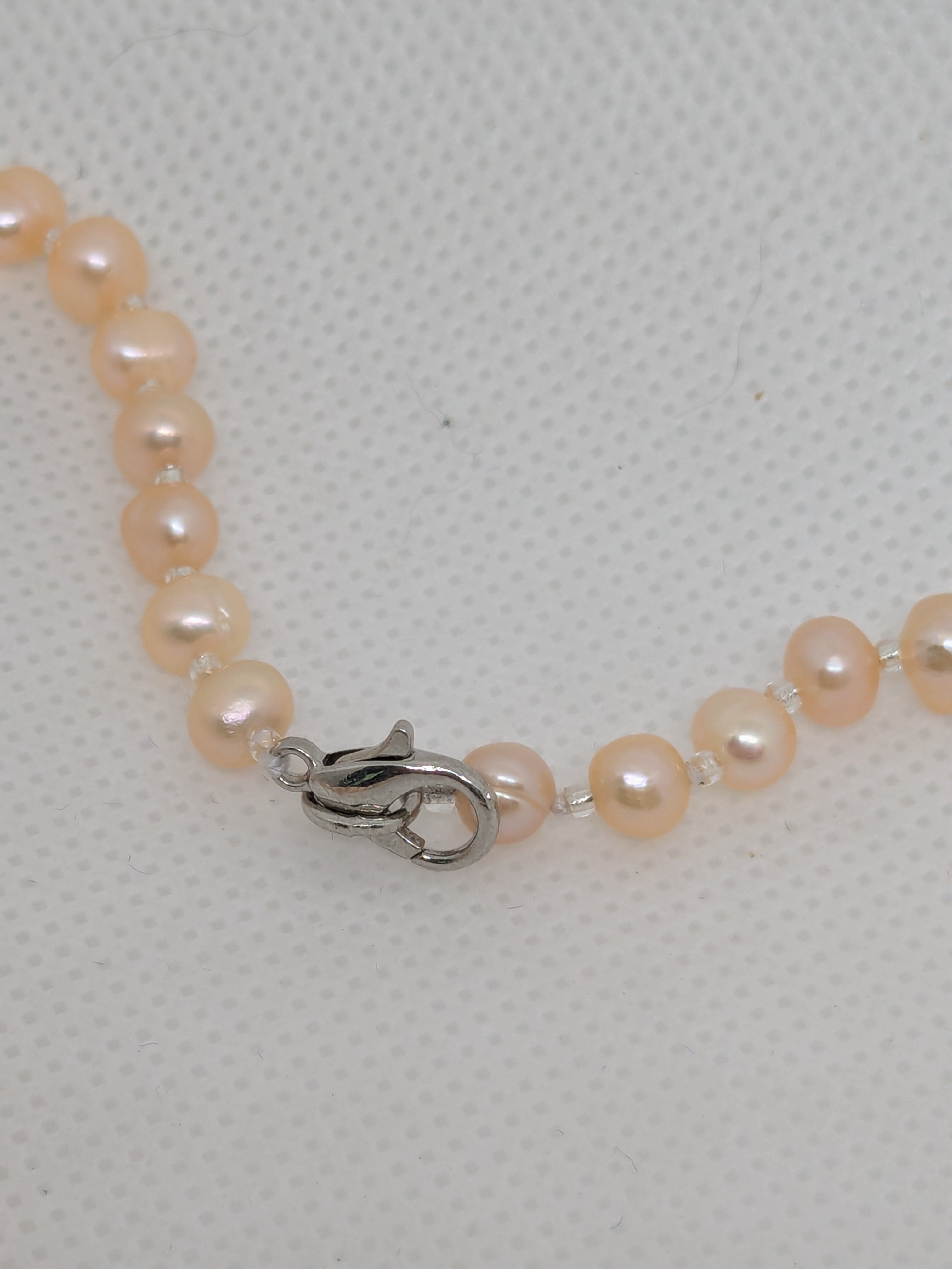 Zhuji Freshwater Pearl Strand with Mother of Pearl Shell Flower Pendant