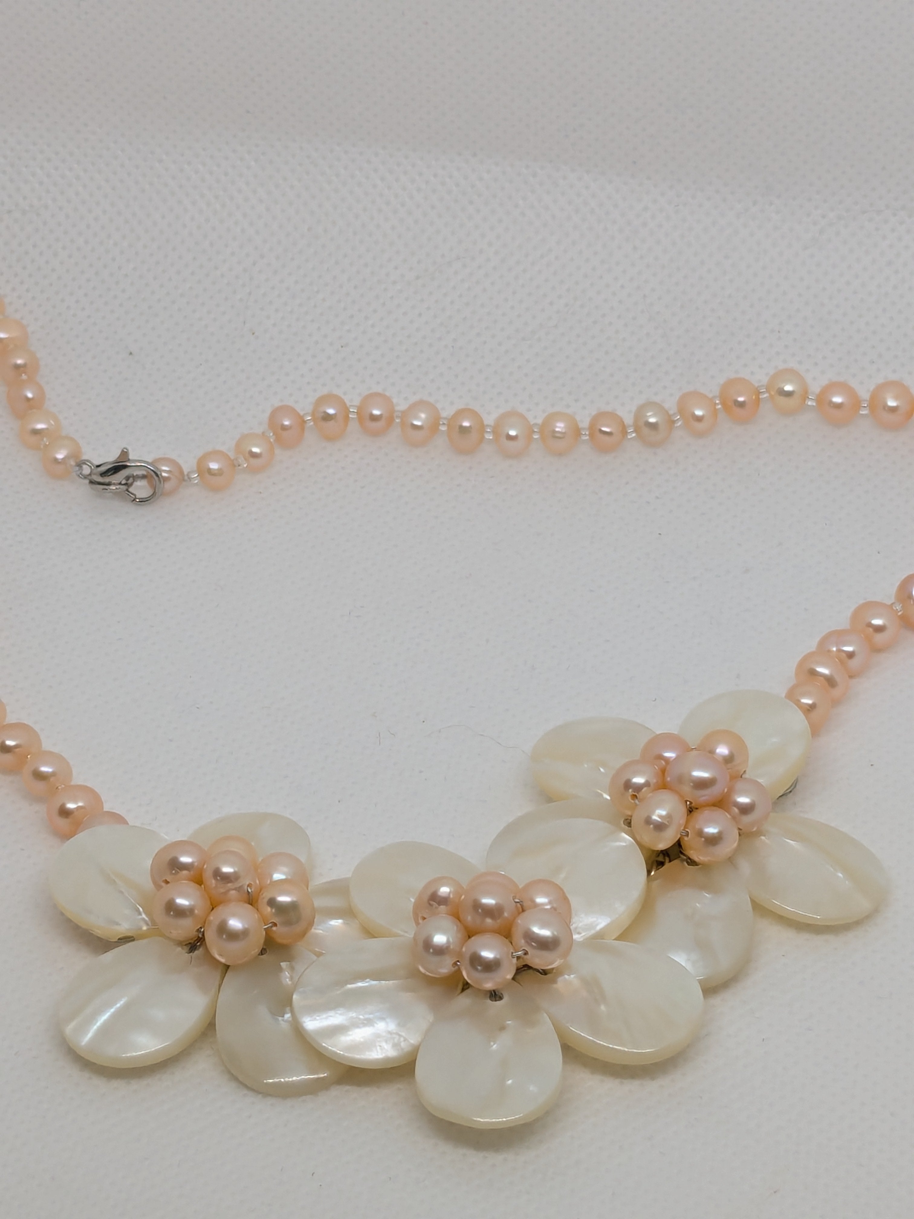 Zhuji Freshwater Pearl Strand with Mother of Pearl Shell Flower Pendant