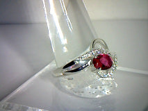 Natural Ruby Ring with Topaz Accents .60 ct/2ctw