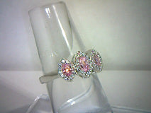 Genuine Pink Sapphire 3 Stone Ring with Genuine Topaz Accents .83ct/3ctw