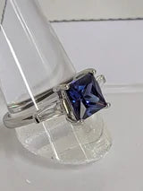 Classic Square Princess Cut 3.5ct Tanzanite Ring with triangular Zircon side accents