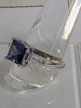 Classic Square Princess Cut 3.5ct Tanzanite Ring with triangular Zircon side accents