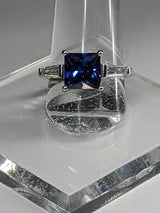 Classic Square Princess Cut 3.5ct Tanzanite Ring with triangular Zircon side accents