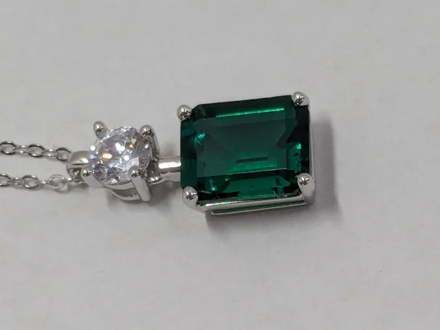 side view point of Emerald cut necklace 